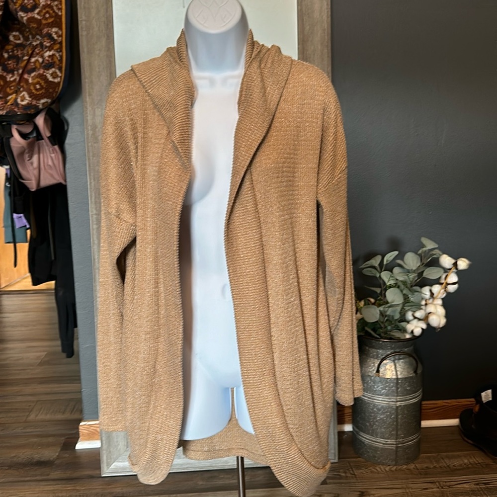 Tan women’s cardigan with hood and pockets